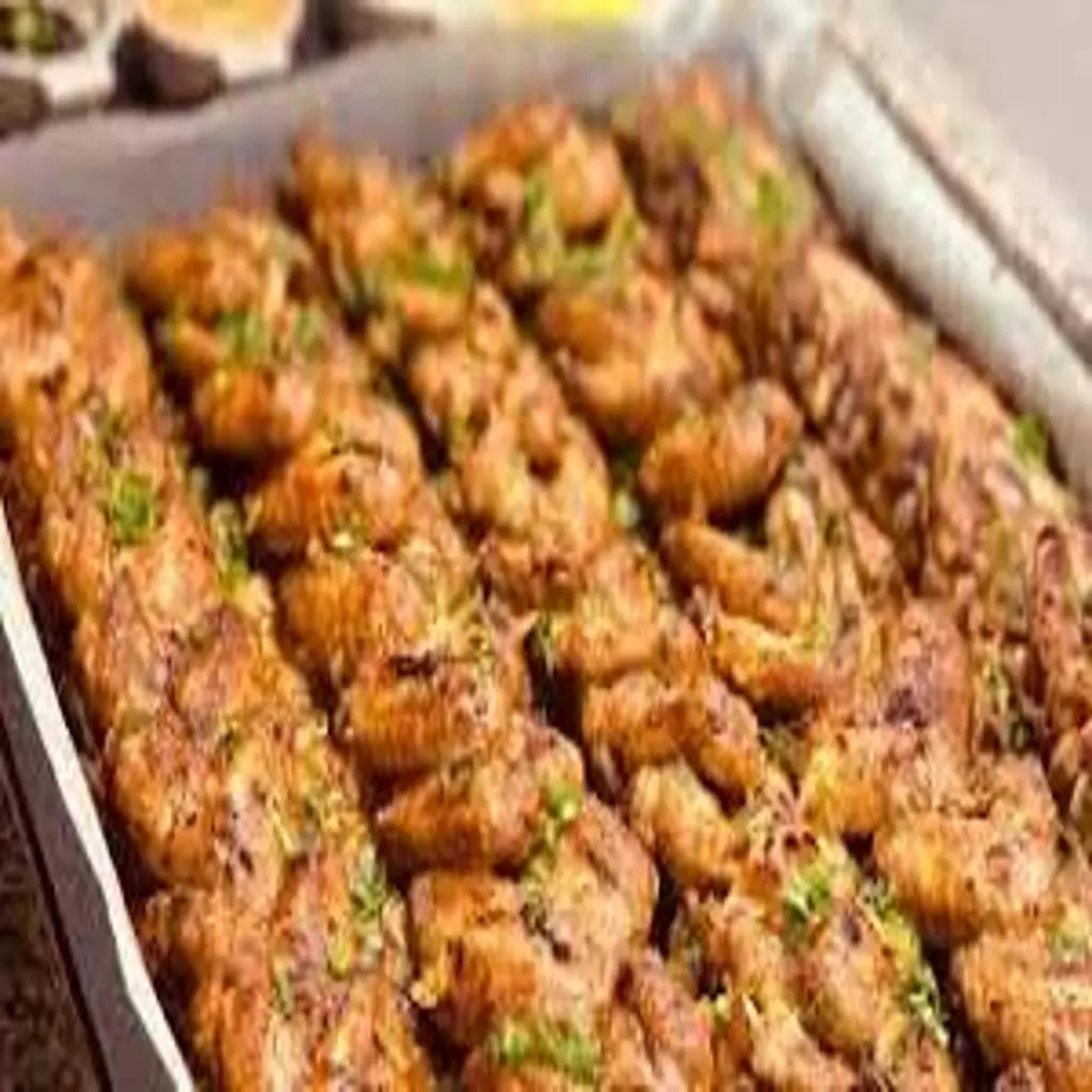 أجنحة دجاج مطفاية ثوم وليمون